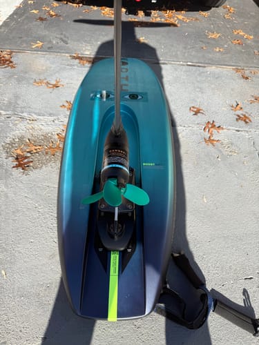 Customer's bright green Foildrive Low Range Propeller 6 installed on the motor of a hydrofoil board.