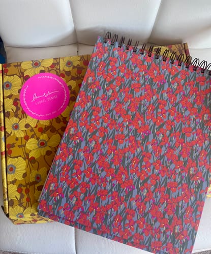 Customer's Jo Planner in the Sunpetal floral design, shown next to its decorative packaging box.
