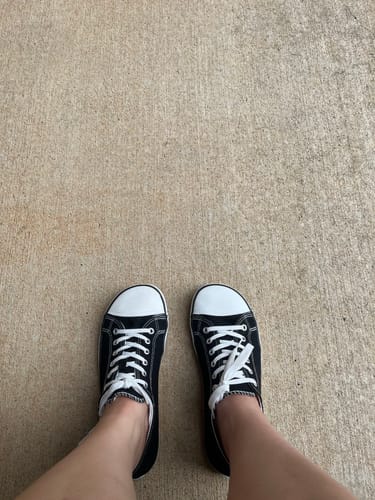 Customer's overhead view of the black Roam I Barefoot Shoes, highlighting the wide toe box.