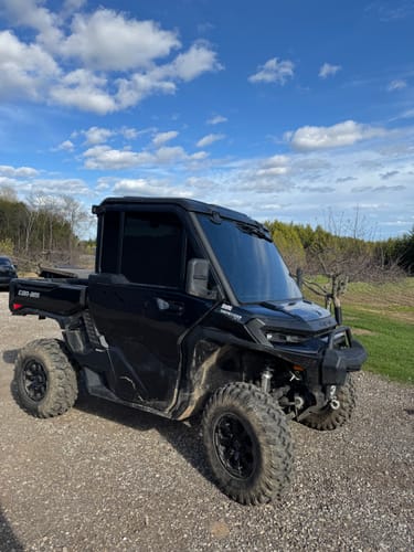 Customer's black utility vehicle showing the dark Terraflex Carbon Tint installed on the windows.