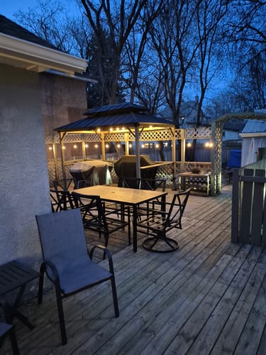 Customer photo review of SUNJOY 8x12 Wood Frame Grill Gazebo with Electrical Outlets and Shelves - Black