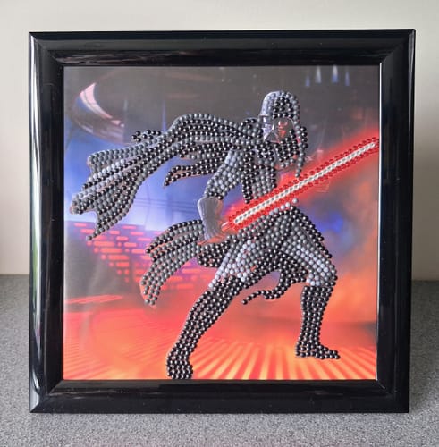 Reviewer's sparkly Darth Vader Crystal Art Card, completed and displayed inside a black frame.