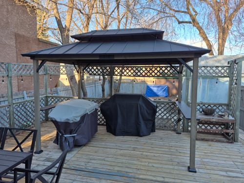 Customer photo review of SUNJOY 8x12 Wood Frame Grill Gazebo with Electrical Outlets and Shelves - Black