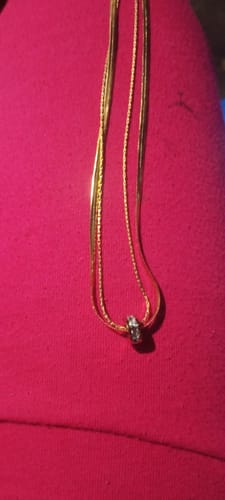 Customer photo review of Gilded Rings Layered Necklace