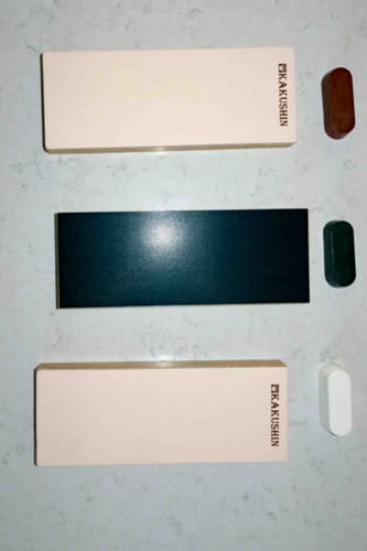 Customer's set of three Leather Strop blocks shown with their brown, black, and white sharpening compounds.