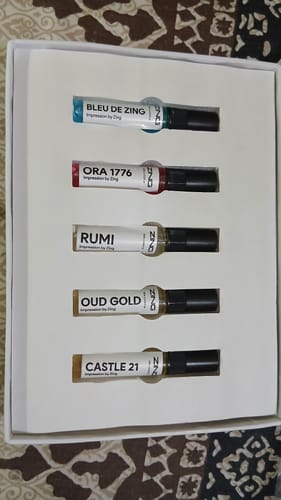 Customer's 'Make Your Own Tester Pack' showing five selected fragrance vials neatly arranged in a white box.