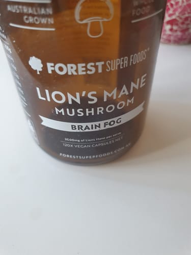 Customer's close-up of the brown bottle of Lions Mane Whole Mushroom Capsules.