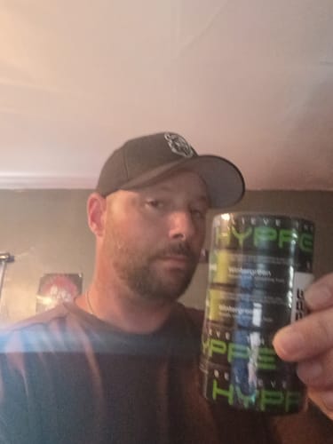 Reviewer holding a multi-pack of HYPPE Moist Pouches.