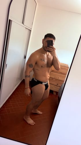 Customer photo review of BLACK SIDE CUT BRIEF
