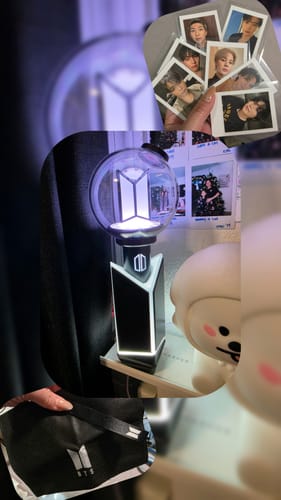 Customer's collage of the lit BTS Official Light Stick in its cradle, alongside a bag and photocards.
