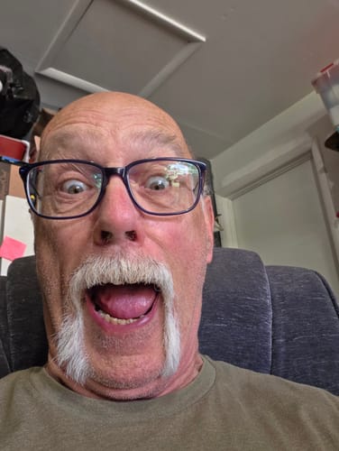A close-up of the reviewer with a surprised expression.