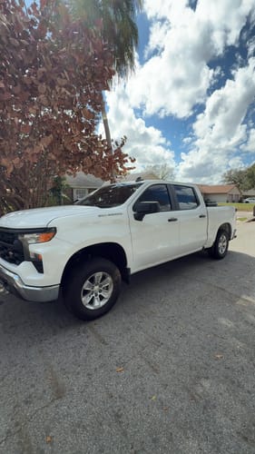 Customer's white Silverado 1500 with the 3" Lift Kit installed, showing its new taller stance.