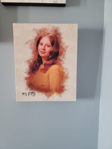 Customer's personalized photo painting of a vintage portrait, rendered in a watercolor style and hung on a wall.