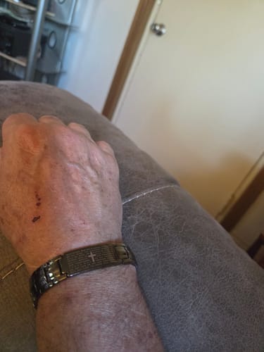 Close-up of a reviewer wearing the engraved Power of the Lord’s Prayer Magnetic Copper Bracelet on their wrist.