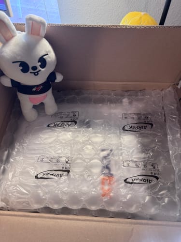 Box containing the customer's Marie Claire magazine set, well-protected by bubble wrap packaging.