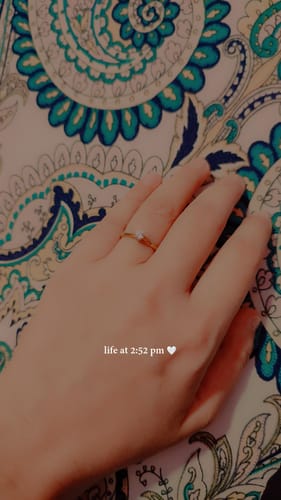 Customer photo review of Dainty Solitaire Ring