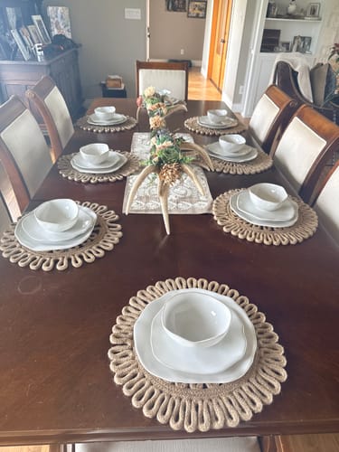 Customer's Organic Deep Bowls in Pearl White styled in elegant place settings on a dining table.