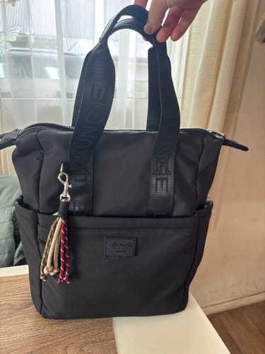 Reseña con foto de un cliente sobre Mochila Llavero Street