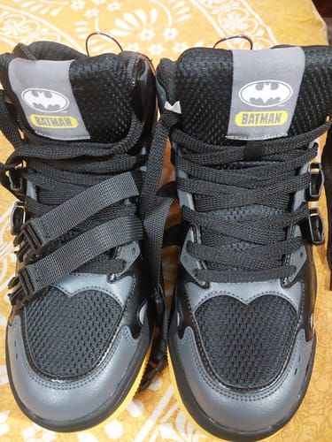 Customer's pair of black and grey Bacca Bucci Sprite boots with a prominent Batman logo on the tongue.