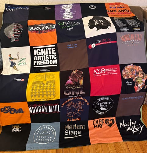 Customer's custom Project Repat T-Shirt Quilt, featuring a colorful patchwork of shirts with various logos and graphics.