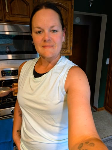 Customer photo review of Flowy Scoop Hem Muscle Tank