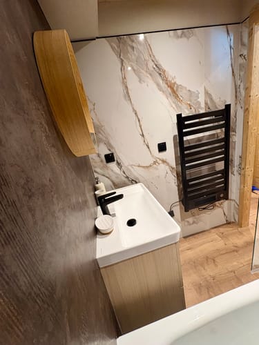 Customer photo review of Panneau Mural Salle de Bain SPC Bronze Cuivré – Étanche & Anti-Rayure
