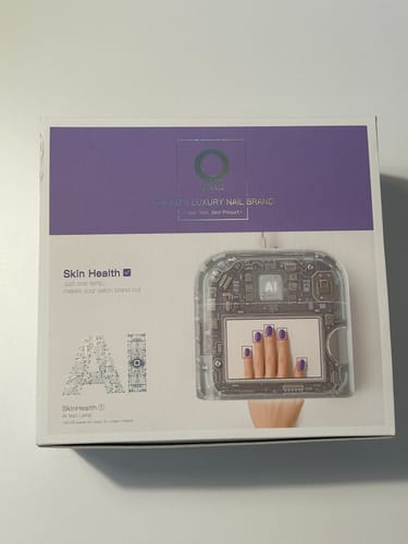 Customer's photo of the white and purple packaging for the ONAIL AI Nail Lamp.