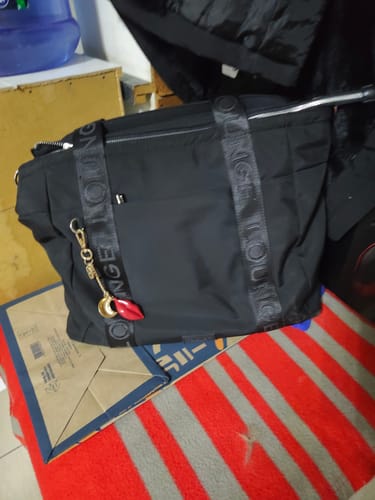 Reseña con foto de un cliente sobre Bolso Nylon Llavero Street