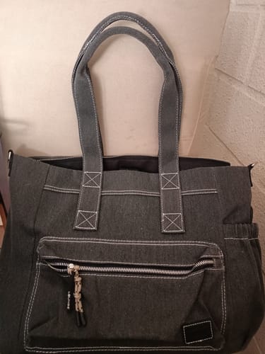 Reseña con foto de un cliente sobre Bolso Notebook Canvas Lavado
