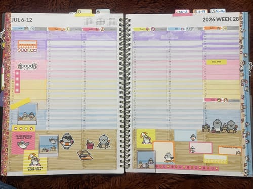 Customer's weekly planner spread for July using colorful stickers from the Ultimate Subscription's Beach Birds theme.