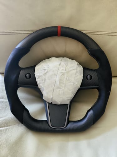 Customer photo review of Custom Dry Carbon Fiber Steering Wheel Replacement for Tesla Model 3 2017-2023