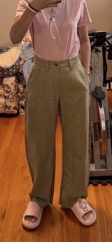 Reviewer standing indoors wearing the Barrel Leg Cargo Pants, showing a comfortable, loose fit.