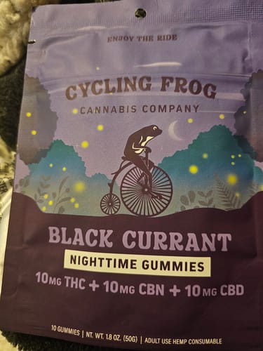 A reviewer's purple bag of Cycling Frog's Black Currant Nighttime Gummies.