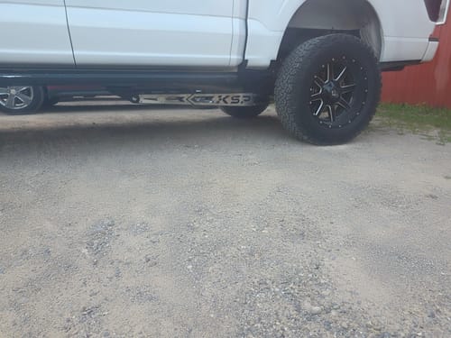 Reviewer's silver Traction Bar Stainless Steel Plate installed on the KSP traction bar under a white truck.