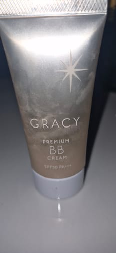 A close-up of the reviewer's pearlescent tube of Integrate Gracy Premium BB Cream.