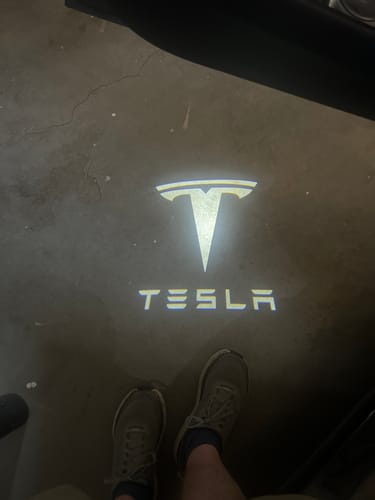 Customer photo review of EVAAM® OEM Ultrabright Door LED Logo Projector for Tesla Accessories