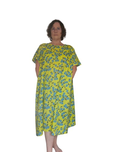 Reviewer models a self-made summer dress using the yellow and blue printed cotton lawn.