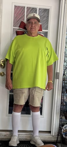 Customer wearing the white Eucalyptus Lyocell Compression Socks pulled up to their knees.