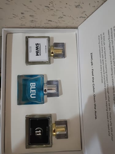 Customer's open Summer Box showing the three included perfumes: 'Afternoon Swim,' 'Bleu,' and '11'.