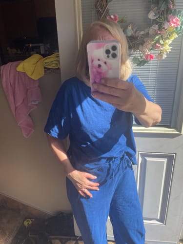 Reviewer standing indoors wearing the blue Zen Cotton Slub Lounge Set, showing its relaxed fit.