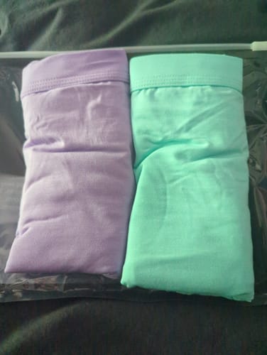 Customer's lavender and aqua Modal Boxer Briefs, folded in clear packaging.