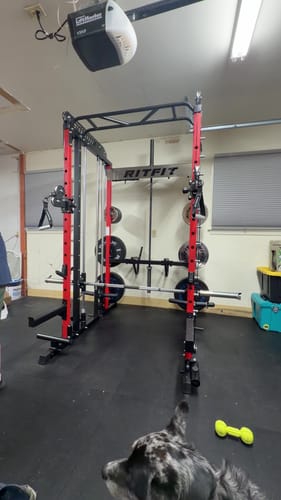 Customer's RitFit M1 Pro power rack and smith machine assembled in a garage.