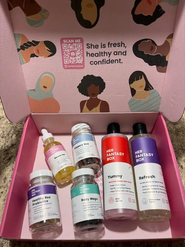 Customer photo of the complete Balance Bundle 2.0, showing all six self-care products inside the open pink box.