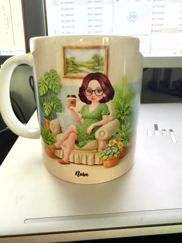 Customer's personalized retirement mug showing a cartoon woman named Nora relaxing with coffee.