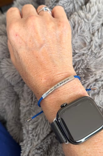 Customer photo review of Remember Who The Fuck You're Tube Bracelet