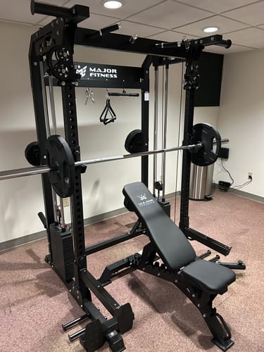 Customer's Major Fitness F22 All-In-One Home Gym, set up in a room with a barbell on the rack and a weight bench in front.