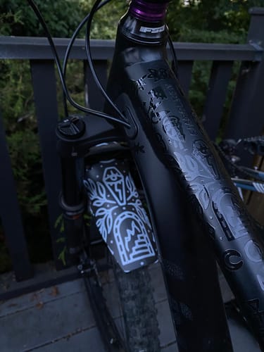 Customer's glossy Occult Transfer Decals applied to a matte black bike frame, shown with a matching mudguard.