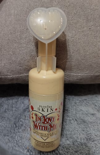 Customer's In Love With Me Foaming Facial Cleanser, featuring a distinct heart-shaped applicator brush.