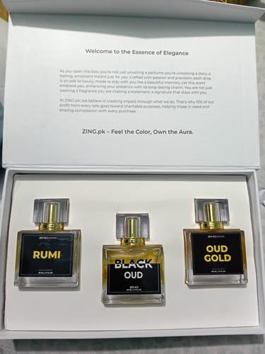 Customer's OUD Supreme BUNDLE with three square fragrance bottles arranged inside the open white box.