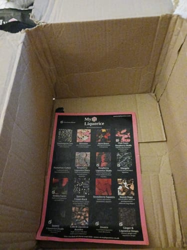 Customer's empty delivery box for the Most Popular Liquorice Mix Bag, with a promotional flyer at the bottom.